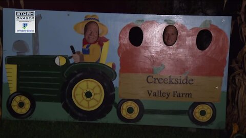 Brian Niznansky and Engineer Dave hop on the pumpkin wagon at Creekside Valley Farm