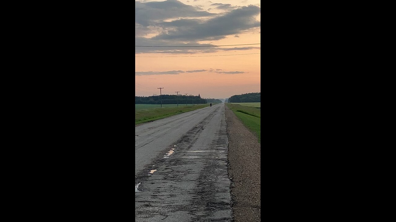 Tim driving down the street with his minibike right after he got it not yt synced