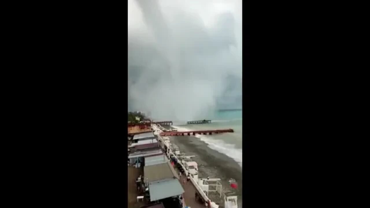 A powerful tornado came out of the sea ashore and destroyed a summer cafe and aerarium