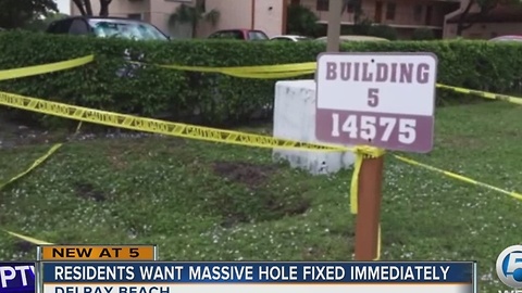 Residents want massive hole fixed immediately