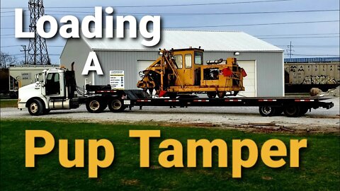 Loading a pup tamper