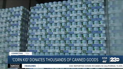 Corn kid donates canned goods