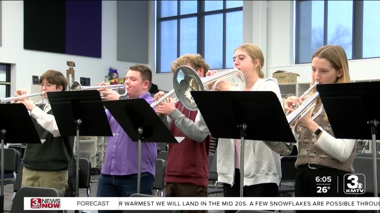 One Omaha high school's musicians perform as University of San Diego's pep band in NCAA volleyball tournament