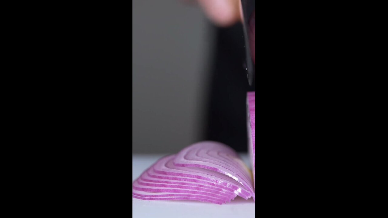 Title: "Mastering the Art of Onion Cutting: Perfectly Equal Slices Every Time!"