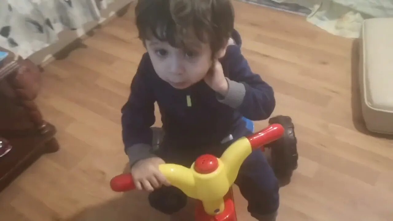 Baby Drei on a bike