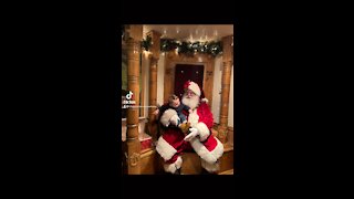 My son seeing Santa for the first time