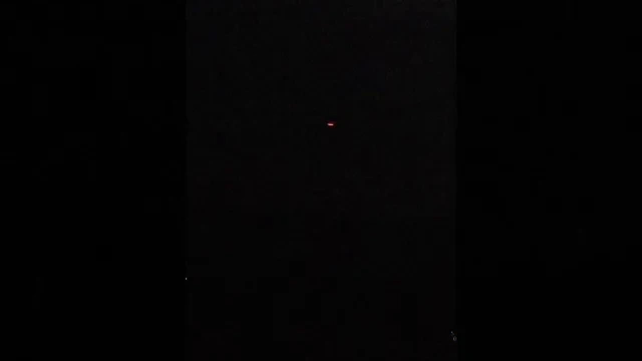 Pair of bright red lights flying by Saint Simons Island, Georgia - October 3, 2020