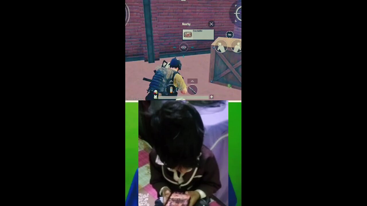 boy playing with pubg mobile