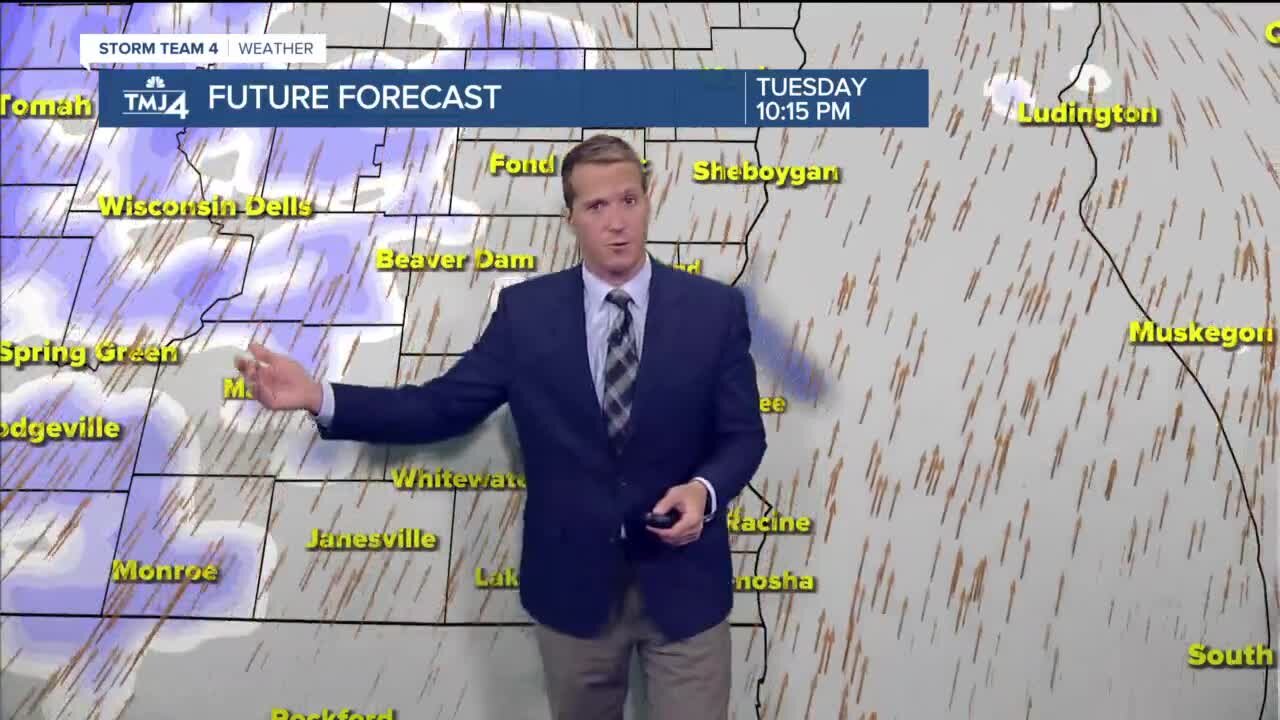 Mostly cloudy, breezy, and warmer Tuesday