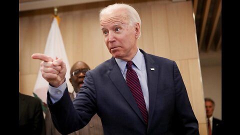 Joe Biden shaking hands with no-one