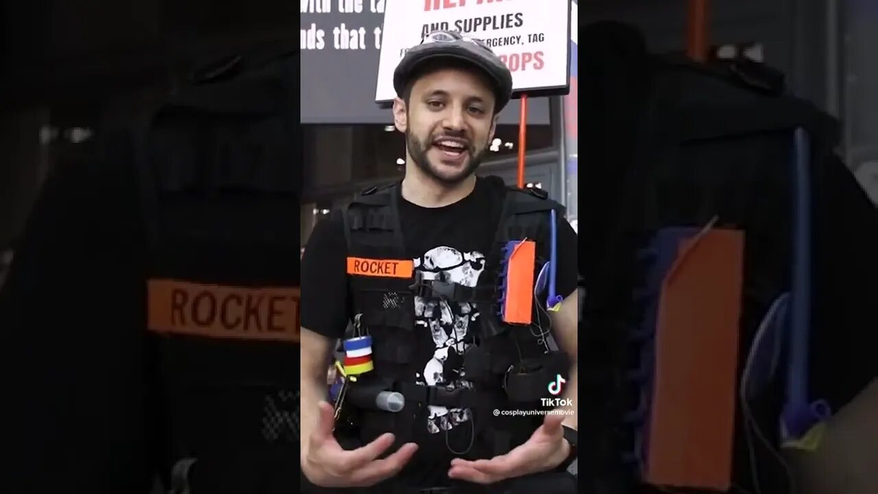 Guy Helping Cosplayer