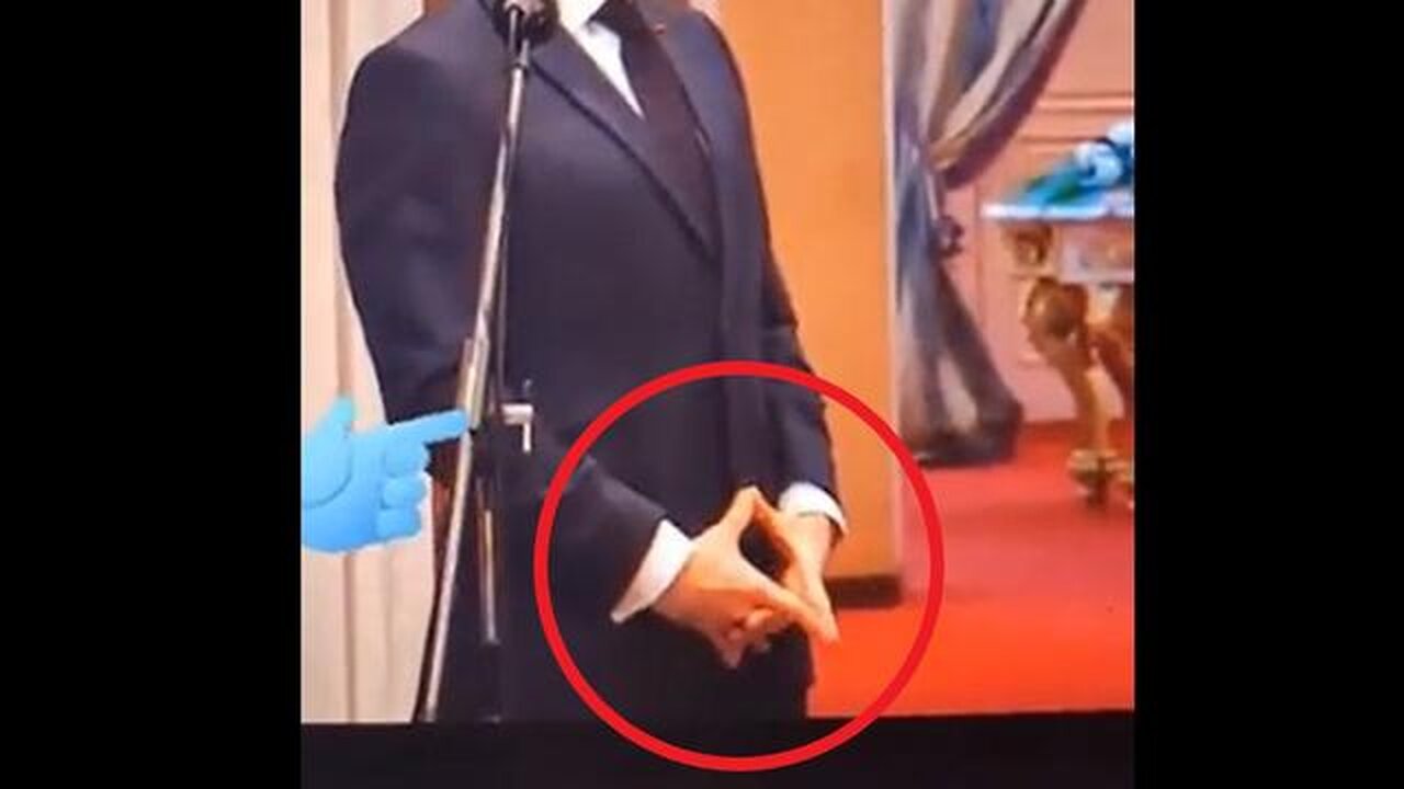 Oh look! It is one of Satan's bitches flashing Illuminati satanic signs on live TV