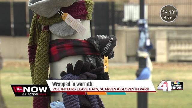 Scarves, gloves, & hats wrapped around Washington Square Park for homeless