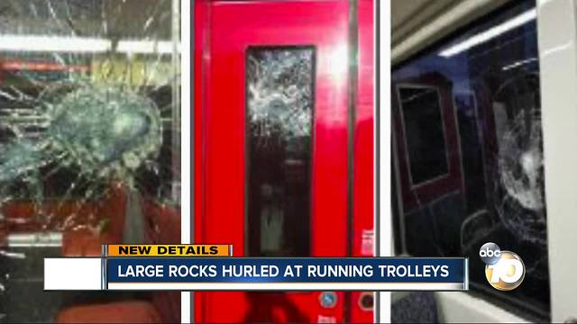 Large rocks hurled at running trolleys