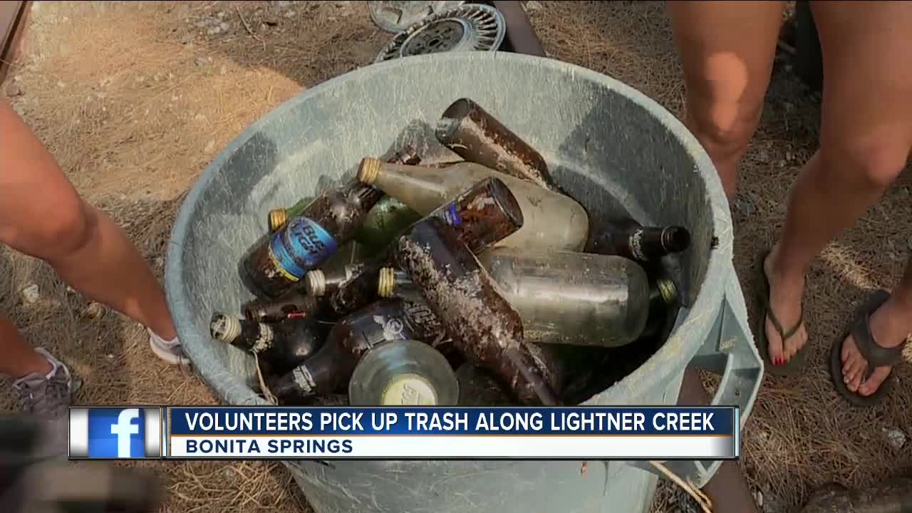 Volunteers clean up trash along Lightner Creek