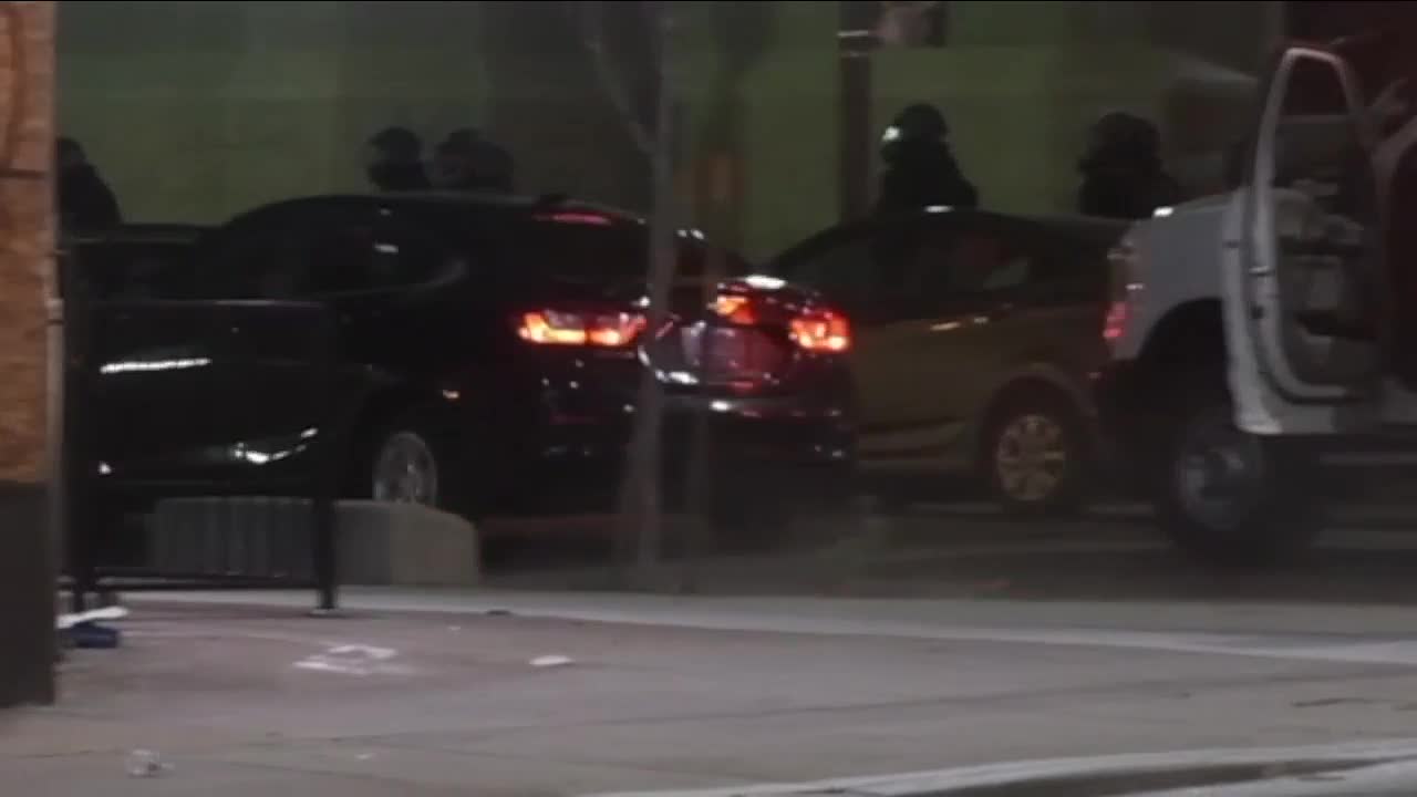 Driver plows into Denver police vehicle injuring officers, civilian
