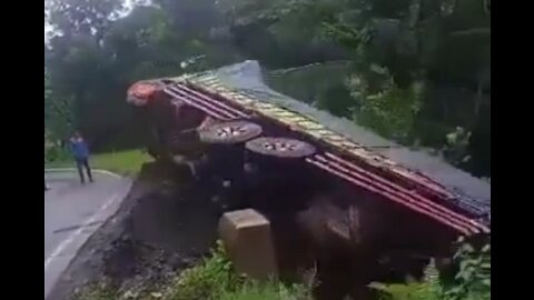 Fuso Hino Truck Rolls Over Into a Ravine