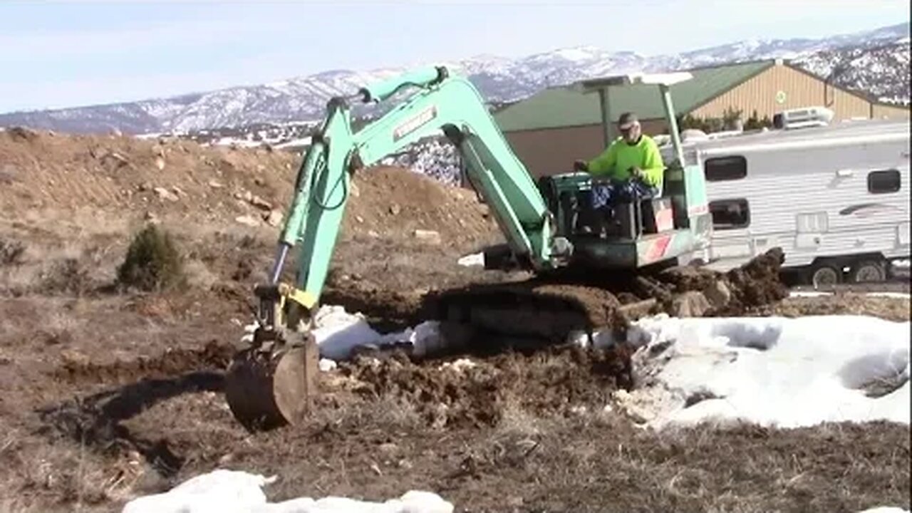 Yanmar YB 451 Repairing A Leaky Dam