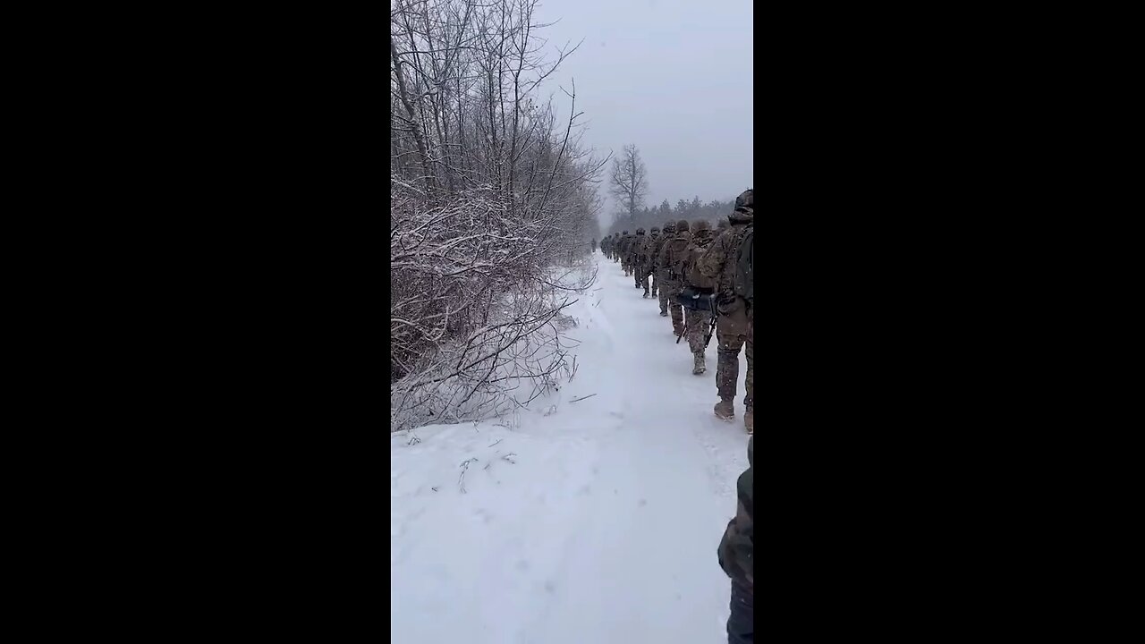 Soldiers marching in the cold snow