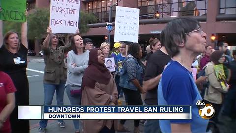 Hundreds protest travel ban ruling