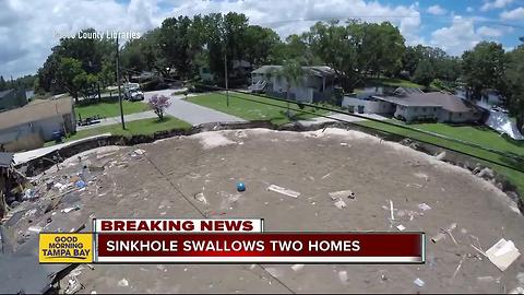 Pasco sinkhole stabilizes after gobbling up 2 houses, threatening 9 more