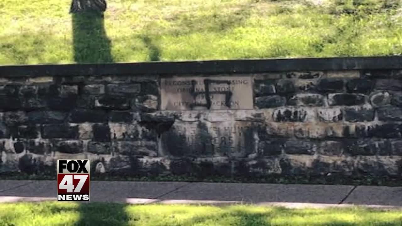 Vandals paint swastika at cemetery where WWII veterans are buried