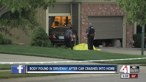 Car into house, man dead outside in north KCMO