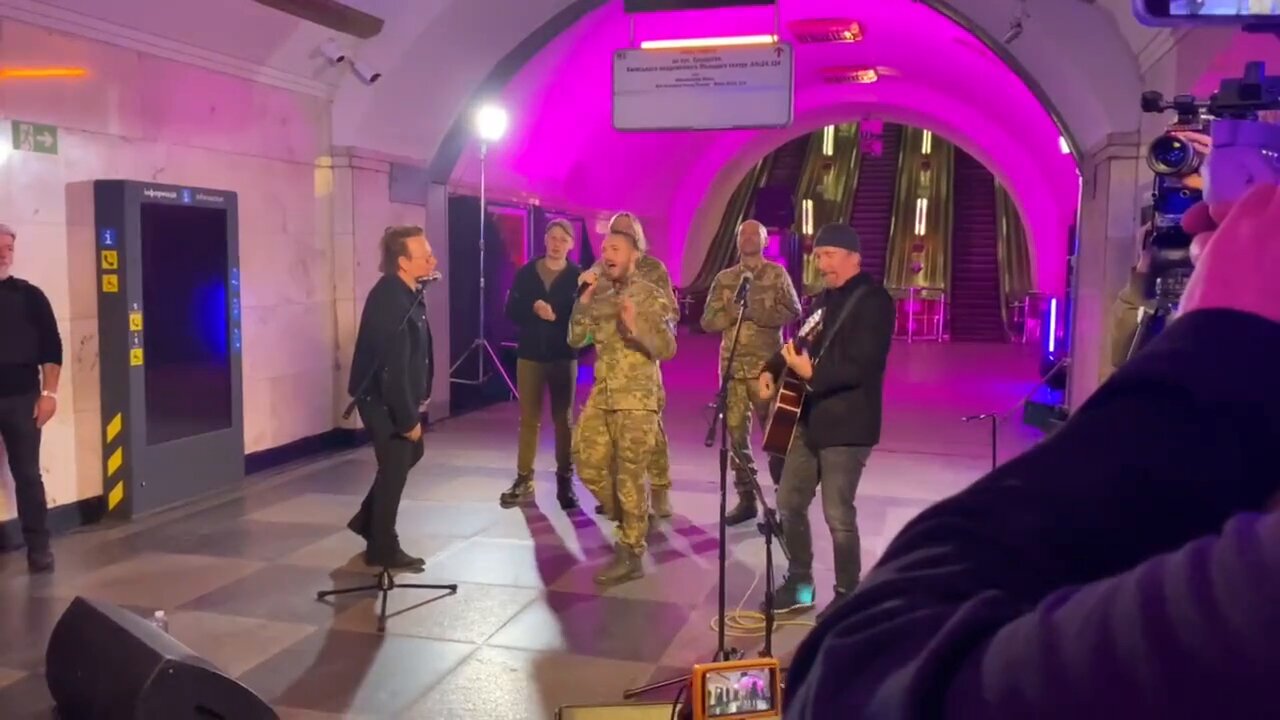 Bono and The Edge performing their new "Slava Ukraini!" song in a subway tunnel