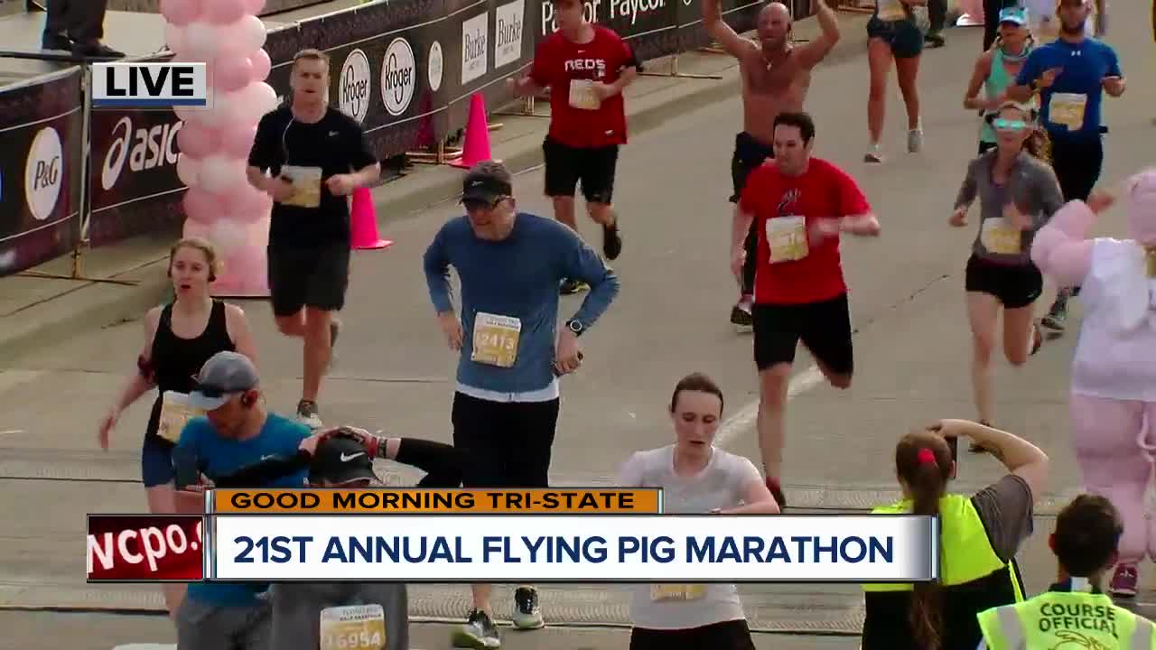 Thousands of half marathoners cross the finish swine