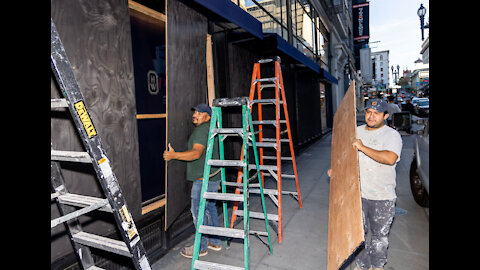 San Francisco Stores Board Up Windows, Police Present