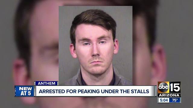 Man arrested for peaking under bathroom stalls at Anthem mall