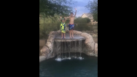 MUST WATCH - Funny big brother jumps in pool with little brother