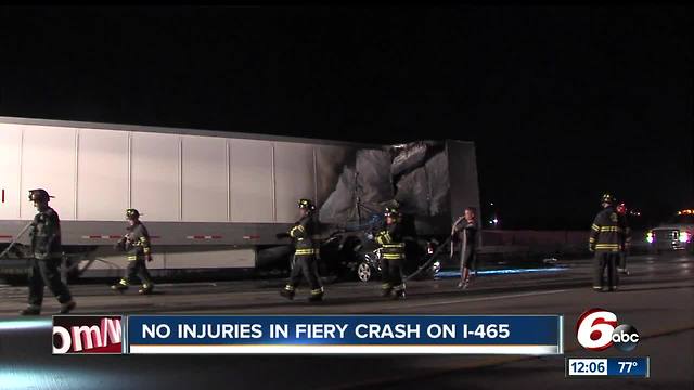 Two passengers pulled to safety after car ends up underneath a semi on I-465 south