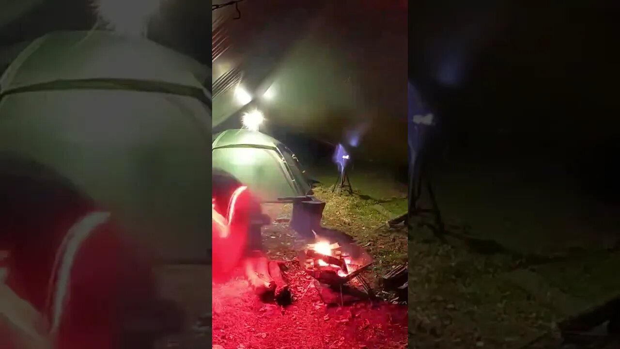 chopping firewood under a tarp in the rain nightlapse Sep 2022