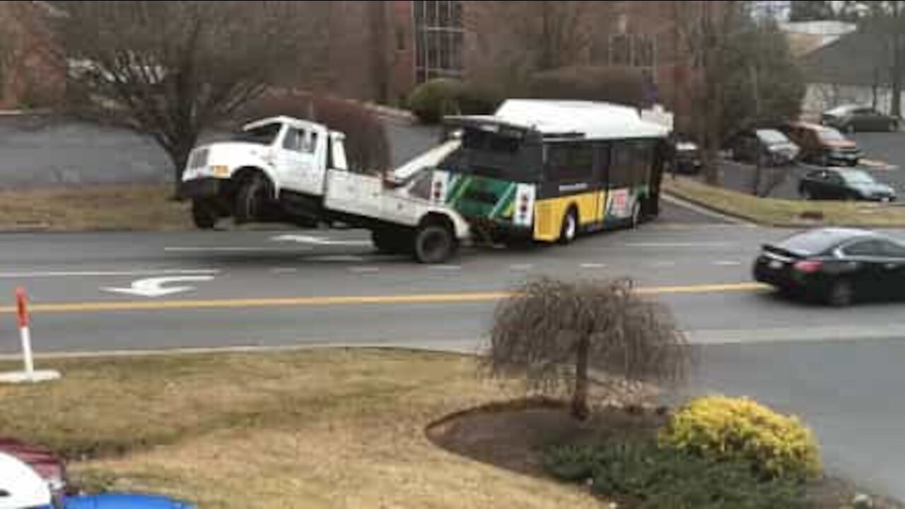 Tow truck unable to tow bus