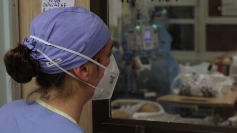 U.S. Air Force Clinical Nurse assists medical personnel at Harbor-UCLA Medical Center