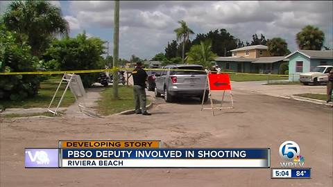 Fugitive with gun shot by PBSO deputy, sheriff's office says