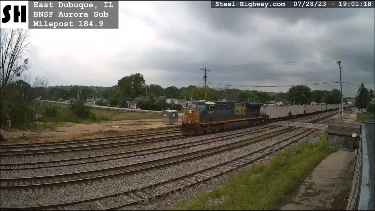 CSX 5267 Leading EB Herzog Ballast Hoppers in East Dubuque, IL on July 28, 2023