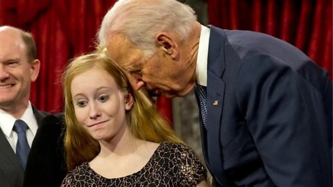 Joe Biden shouts at reporters and grabs their microphones