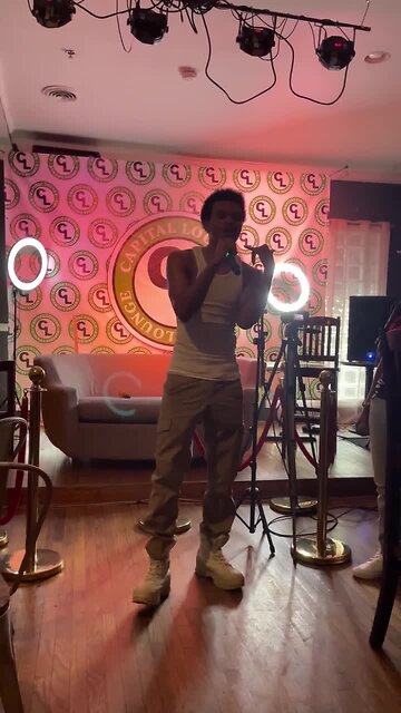 Charm performing at Podcast Party