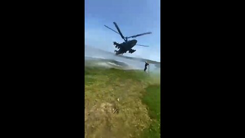 Russian helicopters are having fun on the river beach in Achevsk, LPR