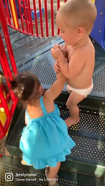 Baby boy gentleman to the little girl