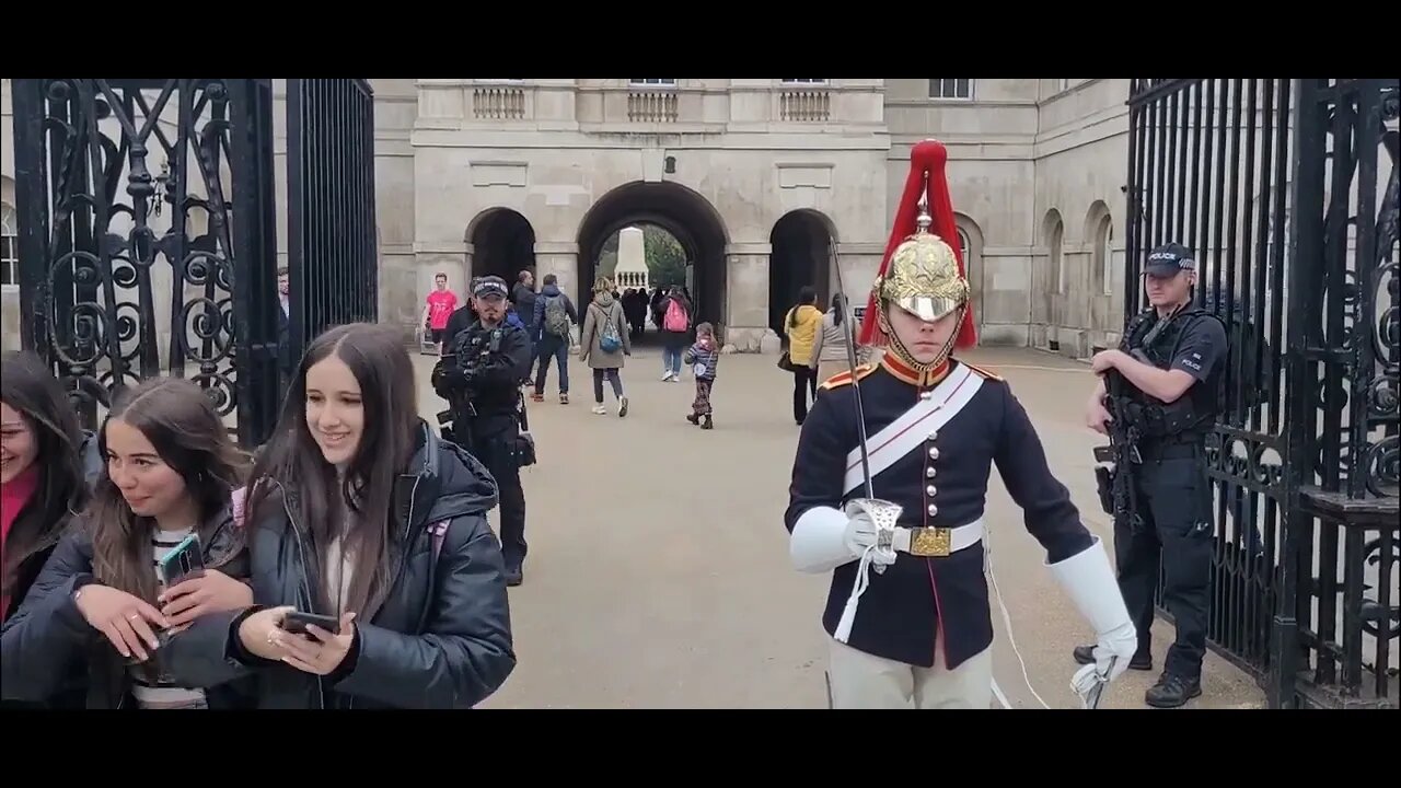 Theses three girls get on the wrong side of the kings guard he uses the elbow #horseguardsparade