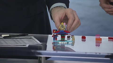 WKBW anchors having fun with building bricks