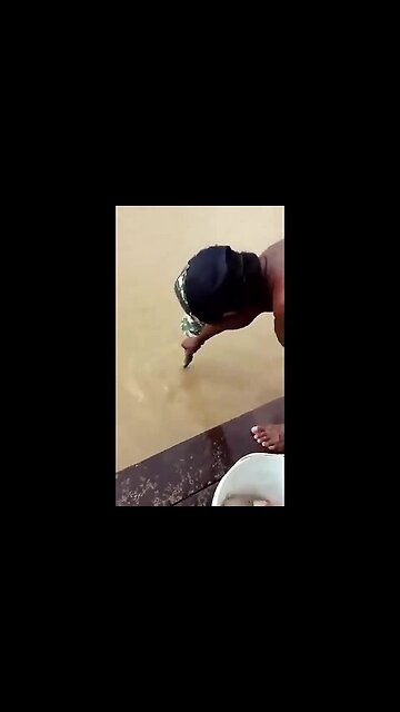 Two guys fishing for piranhas