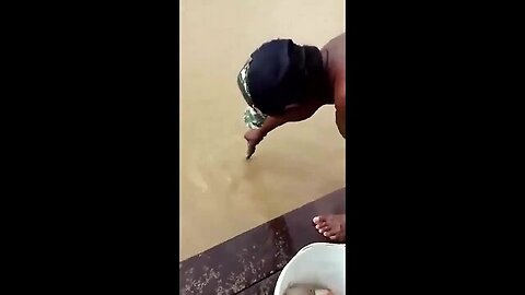 Two guys fishing for piranhas