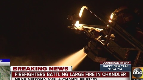 Firefighters battle first-alarm fire at Chandler duplex