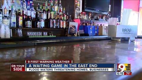 Ohio River floodwaters threaten businesses, homes