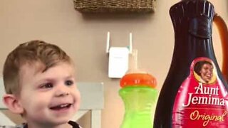 Boy is amazed by dad's magic trick