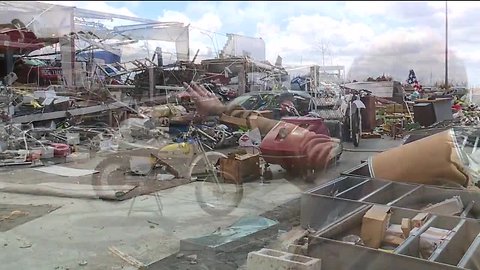 Tornado levels beloved dealership; employees volunteer to help owner
